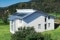 The picture shows a well-insulated house that only needs a small amount of heat.