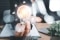 Businesswoman holding a light bulb in the hand.