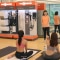 Image of the briefing at EcoCharm Hot Yoga event.